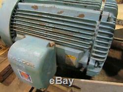 Baldor 150hp electric motor, model #M4406T, with a 3 place hydraulic pump drive